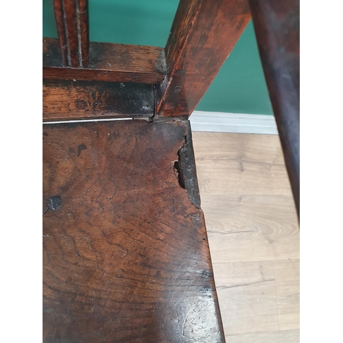 320 - An 18th Century oak child's High Chair with slat back, sabre rear legs and square front supports 3ft... 