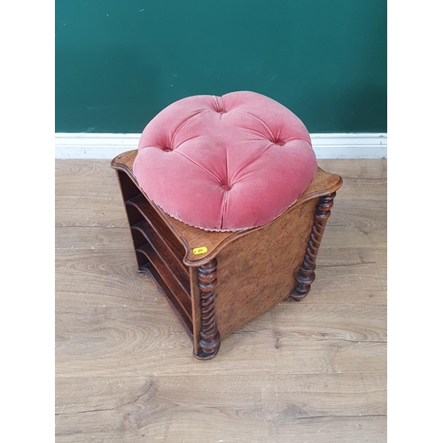 322 - A Victorian walnut Music Stool with button upholstered pink revolving seat above box base with shelv... 