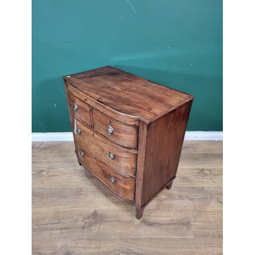 329 - An early 19th Century mahogany D-shape Chest of two short and two long drawers on square tapering le... 