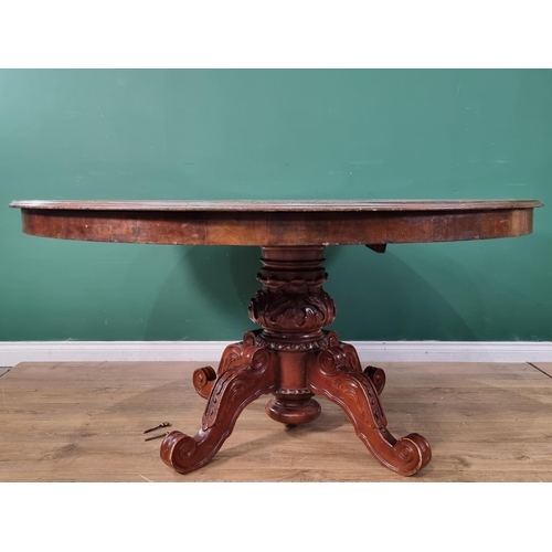 337 - A large marquetry Breakfast Table with central circular floral panel surrounded by panels of flowers... 