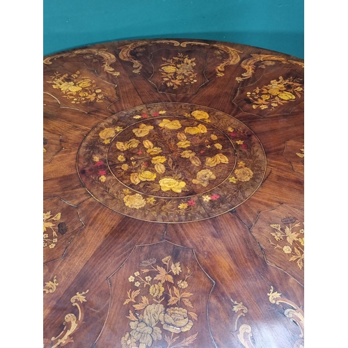 337 - A large marquetry Breakfast Table with central circular floral panel surrounded by panels of flowers... 