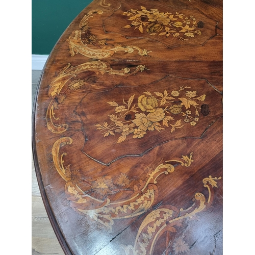 337 - A large marquetry Breakfast Table with central circular floral panel surrounded by panels of flowers... 