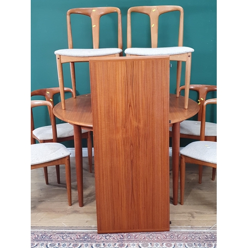 350 - A Danish Uldum Mobelfabrik mid Century Dining Table and six Chairs, the chairs bearing original labe... 