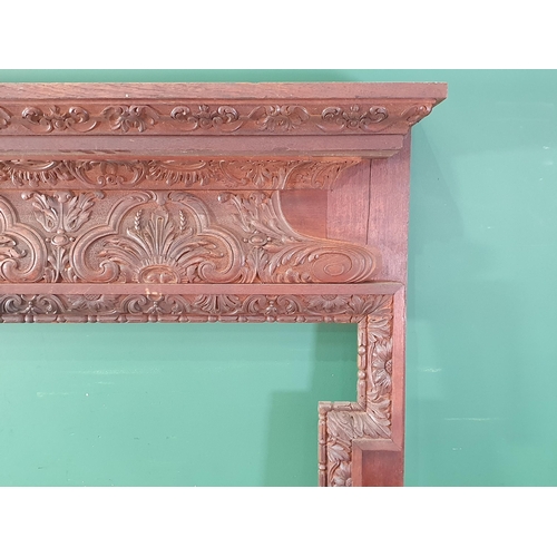 359 - A 19th Century carved Fire Surround with scrolled and foliate designs 5'3