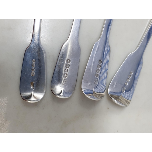 36 - Two 19th Century silver Sauce Ladles fiddle pattern, London 1834 & 1842, and two Dessert Spoons fidd... 