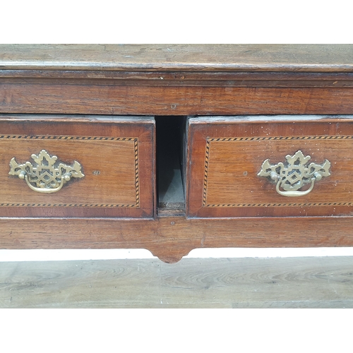 362 - An antique oak Dresser Base, the three frieze drawers with chequer and crossbanding above a shaped f... 