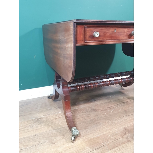 364 - A Regency mahogany Sofa Table in the manner of Gillows fitted two frieze drawers on twin turned colu... 