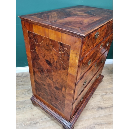 369 - An 18th Century oyster walnut and boxwood string inlaid Chest of Drawers, the moulded and cross band... 