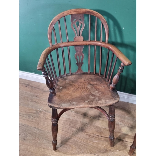 370 - A close matched pair of 19th Century yew and elm Windsor Elbow Chairs with pierced splat backs and c... 