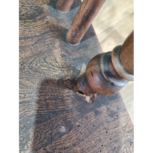 370 - A close matched pair of 19th Century yew and elm Windsor Elbow Chairs with pierced splat backs and c... 