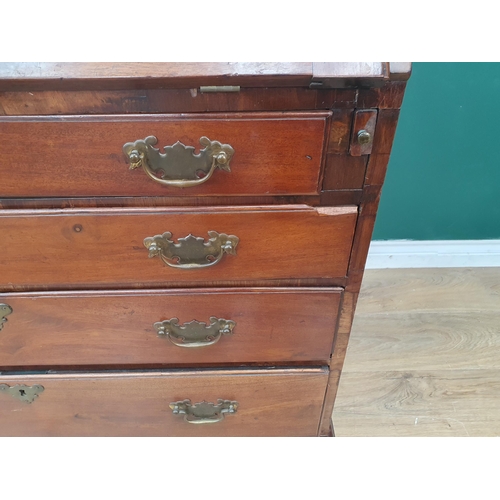 372 - A Georgian mahogany Bureau Bookcase, the upper section with mirror panelled doors, enclosing adjusta... 