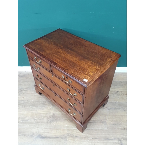 374 - A small 19th Century oak Chest of Drawers crossbanded in mahogany fitted two short and three long gr... 