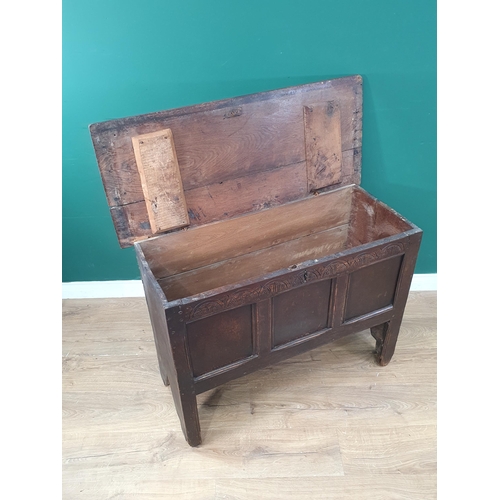 378 - A 17th Century oak Plank Coffer with arcaded frieze above a three panelled front and with original h... 