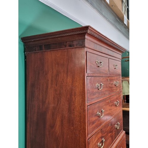 381 - A George III mahogany Chest on Chest with dentil cornice above two short and six long drawers on bra... 