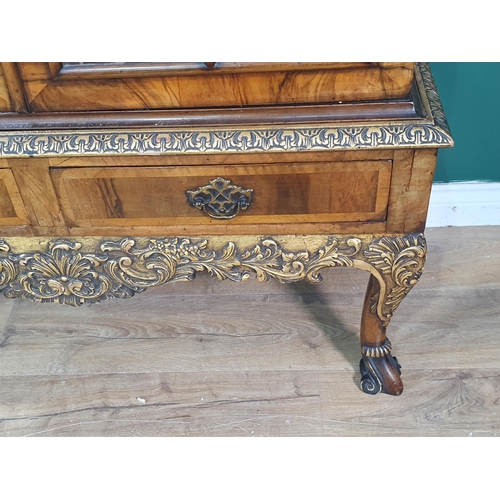 385 - A Queen Anne style carved walnut and gilt Cabinet on stand, the moulded cornice above and pair of gl... 