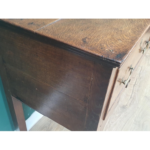 386 - A Georgian oak and crossbanded Dresser Base, fitted three drawers above a shaped frieze on squared s... 