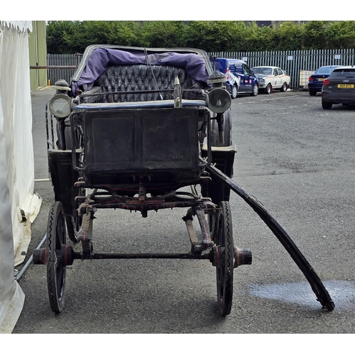 387 - A black painted Horsedrawn Carriage with leather canopy and gilt and red painted detail and button-u... 