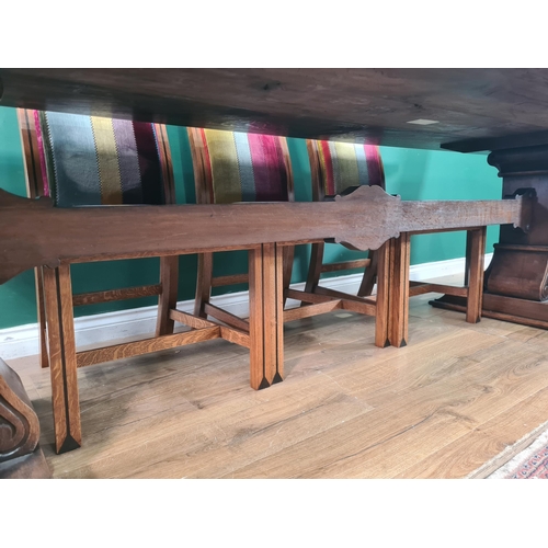 401 - JOHN NETHERCOTT, An oak Refectory Table and eight Dining Chairs, the table having cleated top raised... 