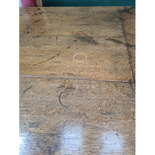 401 - JOHN NETHERCOTT, An oak Refectory Table and eight Dining Chairs, the table having cleated top raised... 