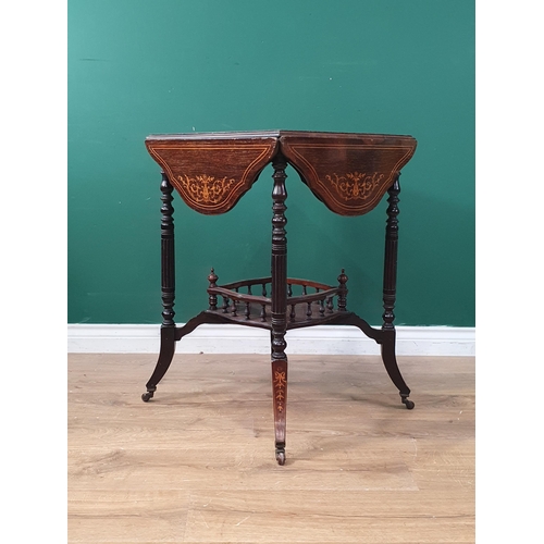 409 - An Edwardian rosewood Occasional Table with satin wood marquetry inlay having four folding flaps rai... 