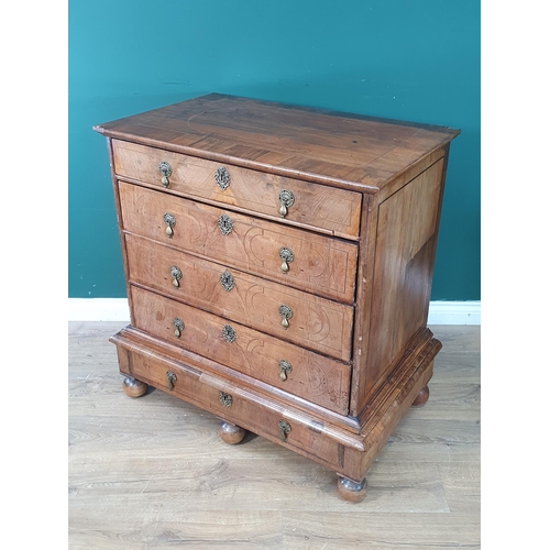 416 - An 18th Century walnut Chest on stand with moulded oval inlaid and crossbanded top above two short a... 