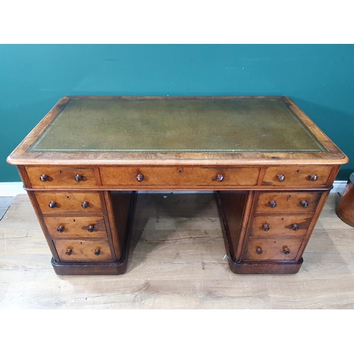 418 - A walnut Pedestal Desk with inset writing surface & fitted nine drawers on a plinth base 4'6