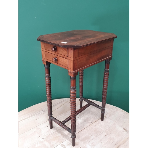 420 - A 19th Century mahogany Work Table with moulded octagonal top, above pair of fitted drawers, with sa... 