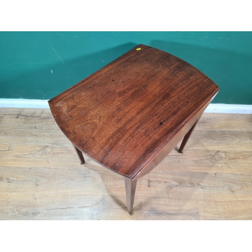 423 - A George III mahogany oval Pembroke Table fitted end drawer on square tapering legs and casters, 2ft... 