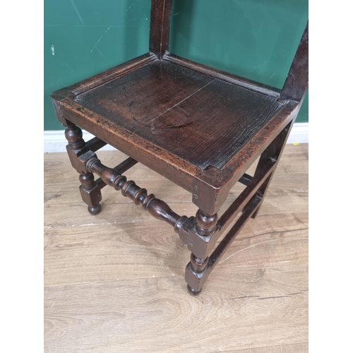 426 - A 17th Century oak Derbyshire Chair with carved and pierced rails with scroll and mask designs, with... 