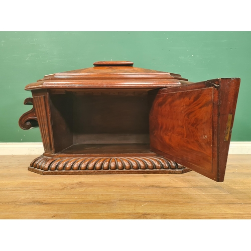 427 - An early 19th Century sarcophagus Wine Cooler (converted to a cupboard) with hinged door to the side... 