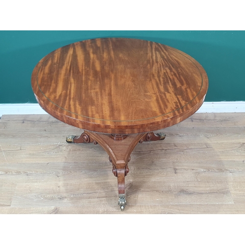 428 - A Regency mahogany circular Centre Table with brass inlaid top on turned and fluted column, concave ... 