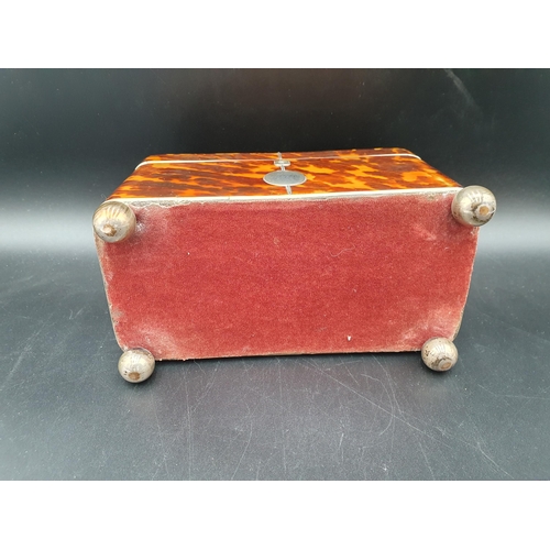 431 - A 19th Century tortoiseshell Tea Caddy with two interior lidded compartments, silver cartouche engra... 