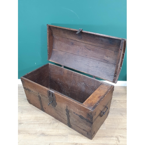 433 - A 17th Century iron bound dome lidded Chest and key, with interior candle box, decorative iron strap... 