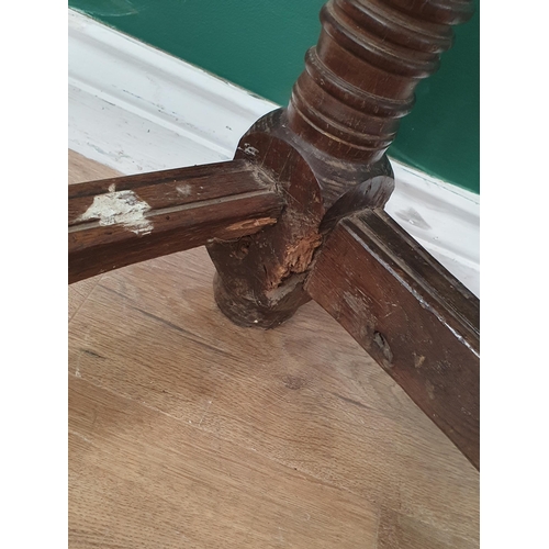 434 - A 17th Century Oak Serving Table with three plank top, raised on ring turned supports, united by str... 