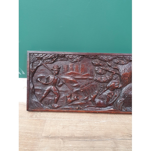 439 - A carved oak rectangular Panel depicting a 