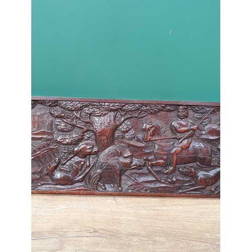 439 - A carved oak rectangular Panel depicting a 