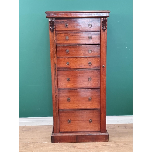 444 - A Victorian rosewood Secretaire Wellington Chest with two drawers above the fitted double secretaire... 