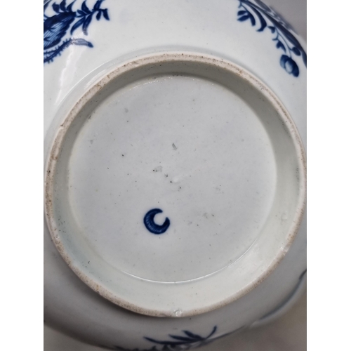 451 - A collection of 18th Century blue and white Worcester and Caughley including, a Bowl decorated with ... 