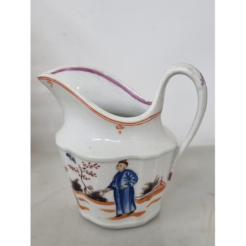 454 - A Newhall porcelain Trio comprising of Tea Bowl, Saucer and Milk Jug, painted Boy and Butterfly patt... 