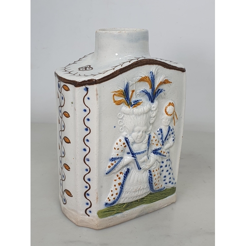 459 - A Prattware Tea Caddy with macaroni moulded figures with painted highlighted decoration (lacking cov... 