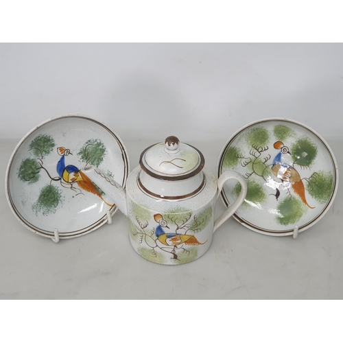 462 - A late 18th/early 19th Century miniature Tea/Coffee Service 'Peahen' pattern, with stylised trees, c... 