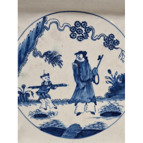 465 - An 18th Century bow porcelain 'Golfer and Caddy' pattern square Dish with shaped rim, and blue wavy ... 