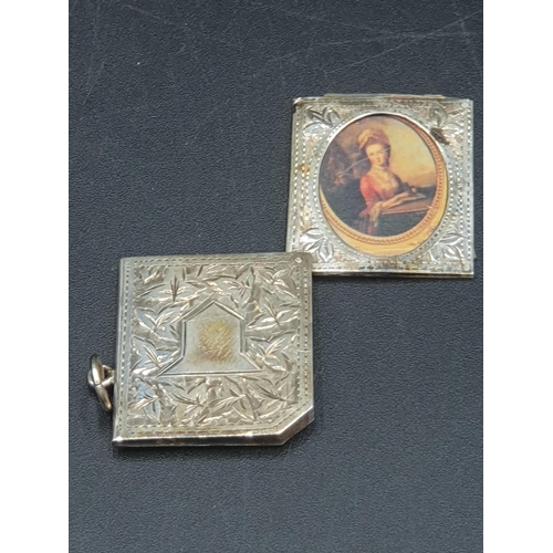 47 - An Edward VII silver Pendant leafage engraved, with vacant cartouche enclosing two oval portrait min... 