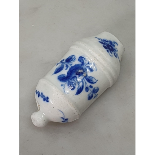 478 - An early 19th Century Blue & White Worcester Porcelain Whistle, decorated with floral swags and bear... 