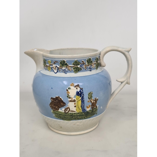 482 - A large 19th Century moulded Prattware Jug depicting hunting scene, A/F, 8in H, another Prattware Ju... 