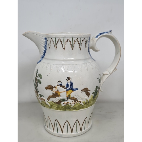 482 - A large 19th Century moulded Prattware Jug depicting hunting scene, A/F, 8in H, another Prattware Ju... 