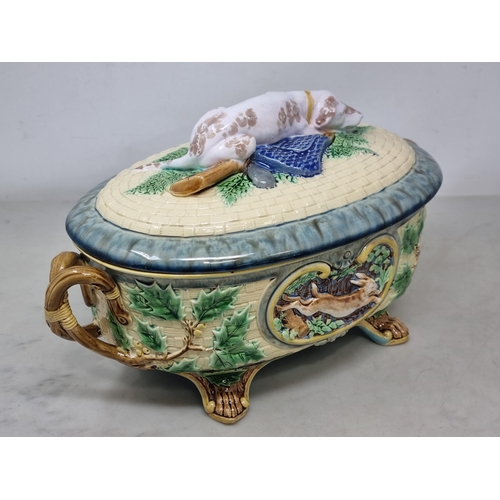 491 - A Victorian Minton majolica Game Pie Dish, Cover and Liner of oval form, the cover modelled with a g... 