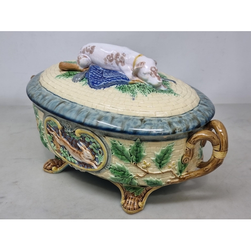 491 - A Victorian Minton majolica Game Pie Dish, Cover and Liner of oval form, the cover modelled with a g... 