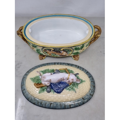 491 - A Victorian Minton majolica Game Pie Dish, Cover and Liner of oval form, the cover modelled with a g... 