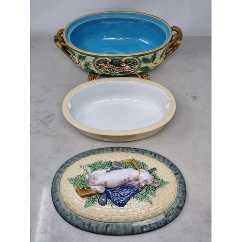 491 - A Victorian Minton majolica Game Pie Dish, Cover and Liner of oval form, the cover modelled with a g... 